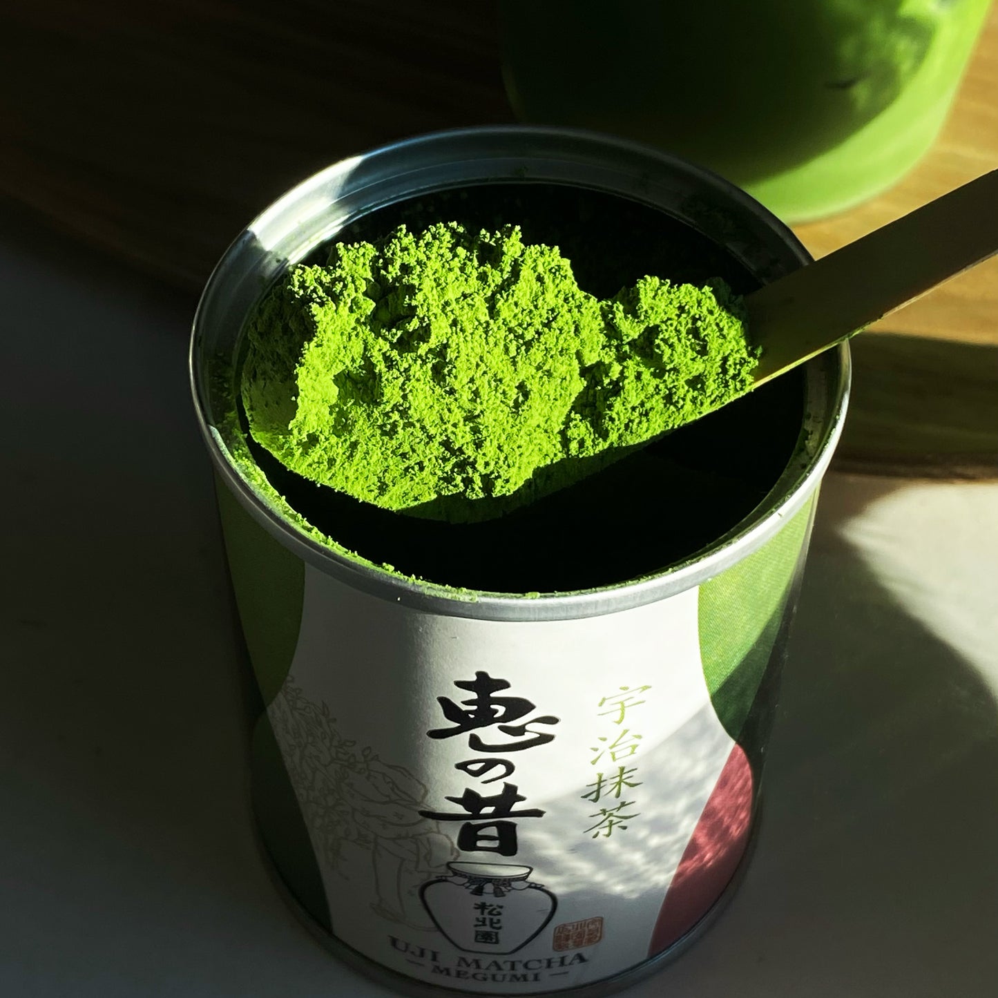 Megumi matcha powder inside the megumi matcha can.