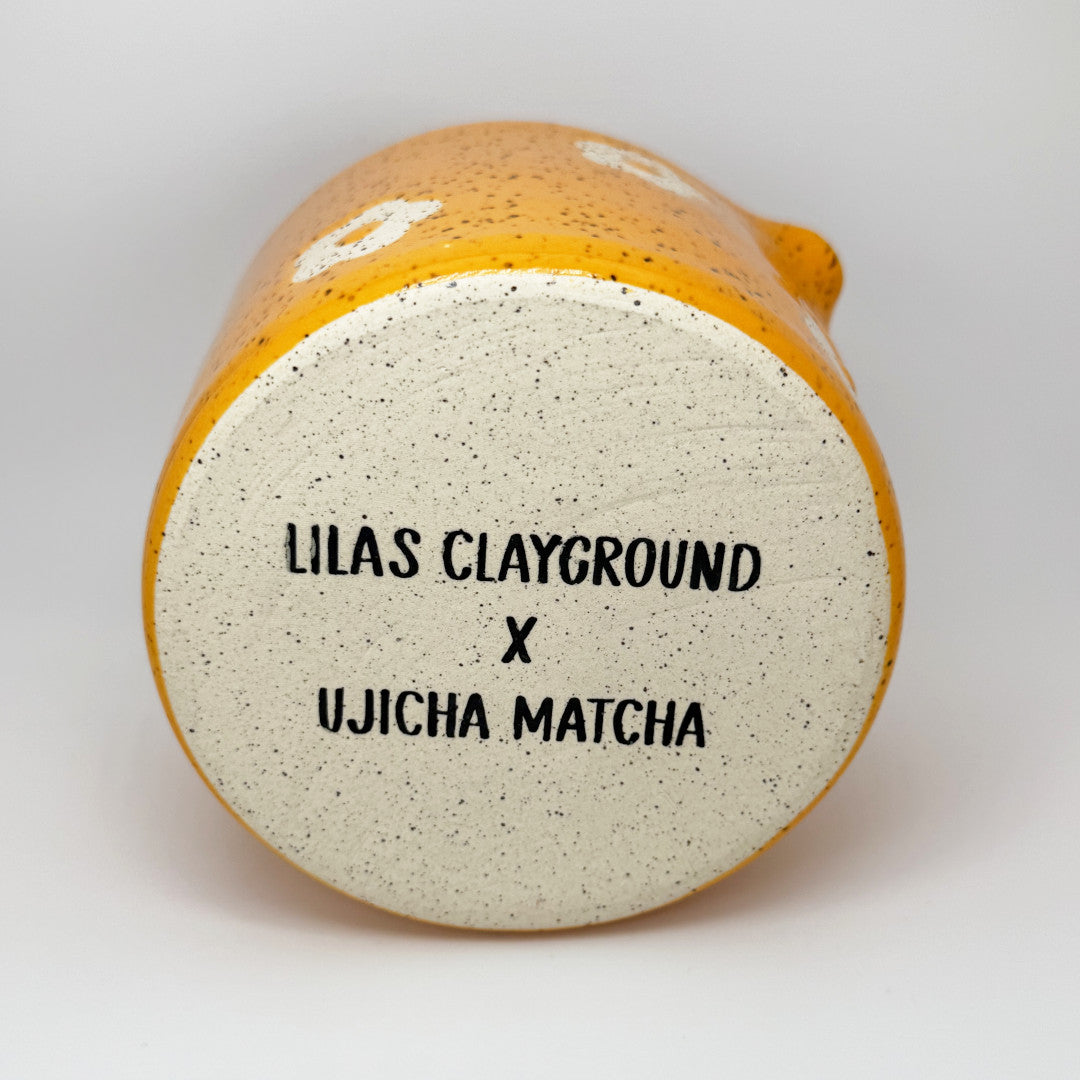 Orange Chawan - Lila's Clayground X Ujicha Matcha. Bottom showing collab stamp.