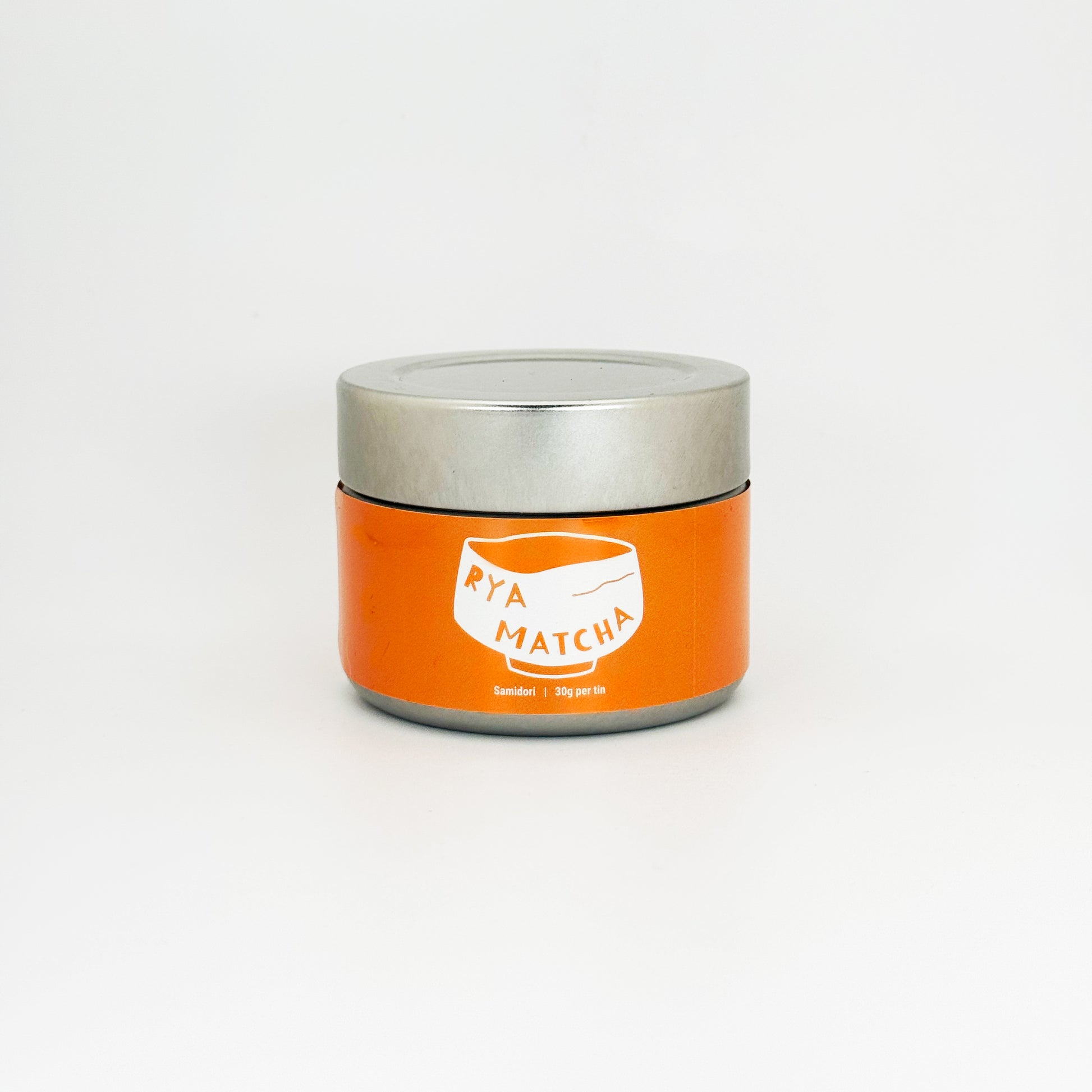 Orange Rya Matcha container with silver lid on a white background. Samidori variety, 30 gram tin.