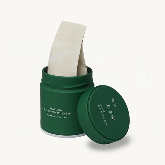 Hatsu no Mukashi Matcha - Nakamura Tokichi - 30 Gram Tin Can. Open showing a bag inside