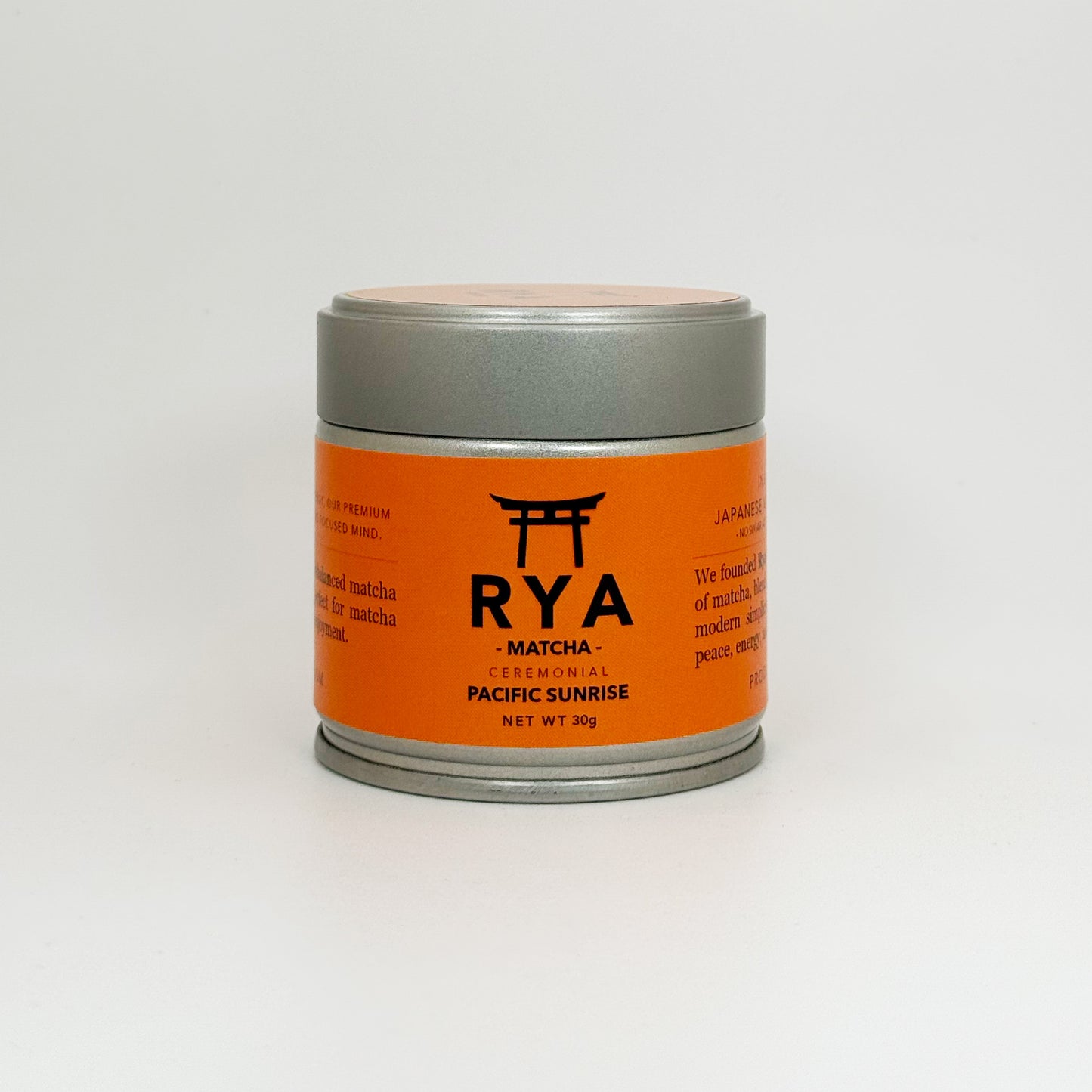 Orange and silver RYA matcha container on a white background